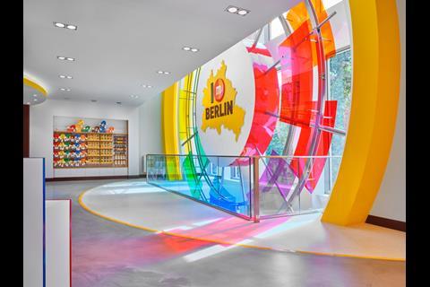 Interior of M&M's Berlin store featuring merchandise and a sign saying 'I M Berlin'